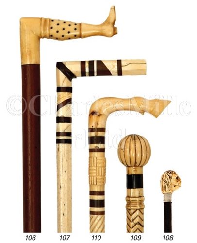 Lot 106 - A 19TH-CENTURY MARINE IVORY AND WOOD WALKING...