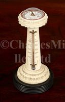 Lot 200 - Ø  A 19TH-CENTURY TURNED IVORY DESK INSTRUMENT...