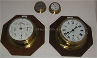 Lot 313 - A BULKHEAD CLOCK AND BAROMETER SET BY...