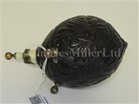 Lot 68 - Ø A SAILORWORK CARVED COCONUT BUGBEAR POWER FLASK, FIRST HALF 19TH CENTURY