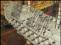 Lot 261 - A LARGE, FINELY CARVED AND WELL PRESENTED EARLY 19TH CENTURY NAPOLEONIC FRENCH PRISONER OF WAR BONE SHIP MODEL FOR A FIRST RATE SHIP OF THE LINE TRADITIONALLY IDENTIFIED AS H.M.S. CALEDONIA