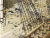 Lot 261 - A LARGE, FINELY CARVED AND WELL PRESENTED EARLY 19TH CENTURY NAPOLEONIC FRENCH PRISONER OF WAR BONE SHIP MODEL FOR A FIRST RATE SHIP OF THE LINE TRADITIONALLY IDENTIFIED AS H.M.S. CALEDONIA