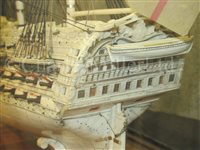 Lot 261 - A LARGE, FINELY CARVED AND WELL PRESENTED EARLY 19TH CENTURY NAPOLEONIC FRENCH PRISONER OF WAR BONE SHIP MODEL FOR A FIRST RATE SHIP OF THE LINE TRADITIONALLY IDENTIFIED AS H.M.S. CALEDONIA