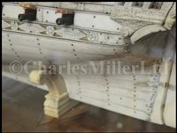 Lot 261 - A LARGE, FINELY CARVED AND WELL PRESENTED EARLY 19TH CENTURY NAPOLEONIC FRENCH PRISONER OF WAR BONE SHIP MODEL FOR A FIRST RATE SHIP OF THE LINE TRADITIONALLY IDENTIFIED AS H.M.S. CALEDONIA
