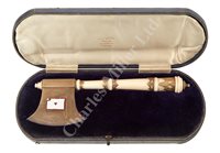 Lot 154 - Ø A SILVER MOUNTED IVORY AND ENAMEL LAUNCHING HATCHET FOR THE S.S. PENTWYN, 1910