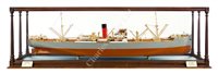 Lot 279 - A FINE BUILDER'S MIRROR-BACK HALF MODEL FOR THE CARGO SHIP S.S. 'PORT CAROLINE' BUILT FOR THE DOMINION AND COMMONWEALTH LINE LTD (PORT LINE) BY WORKMAN CLARK & CO. LTD, BELFAST, 1919