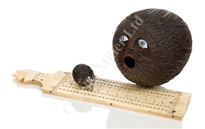 Lot 69 - AN EARLY 19TH CENTURY SAILORWORK CARVED COCONUT