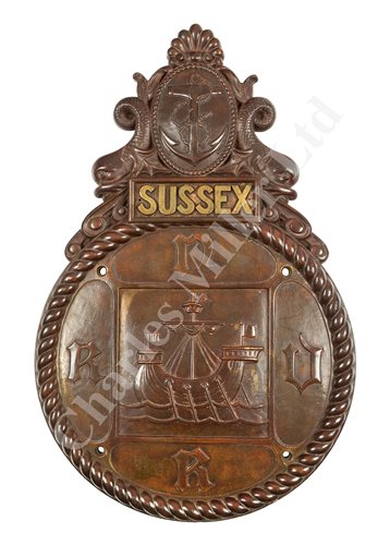 Lot 56 - A FINELY CAST BRONZE BADGE FOR H.M.S. SUSSEX R.N.V.R.