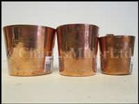 Lot 36 - A SET OF GEORGE VI COPPER GROG MEASURES