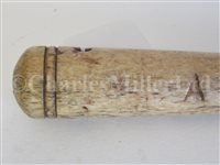 Lot 82 - Ø A 19TH CENTURY SAILORWORK FID; and a model harpoon