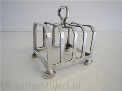 Lot 80 - ORIENT LINE: AN ARTE DECO PLATED TOAST RACK