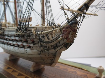 Lot 73 - A NAPOLEONIC FRENCH PRISONER-OF-WAR BONE MODEL FOR THE 74-GUN FRIGATE ILLUSTRIOUS, CIRCA 1810