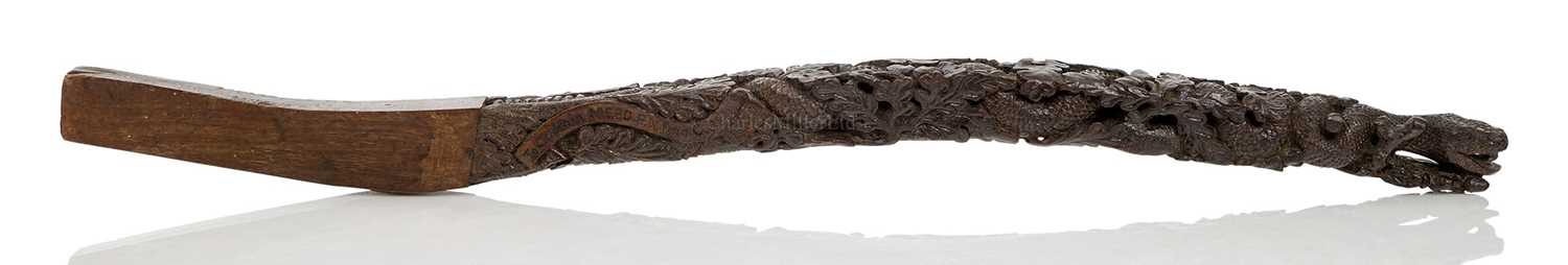 Lot 90 - A FINELY CARVED PRESENTATION TILLER FOR HMS RATTLESNAKE, CIRCA 1870