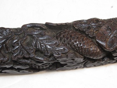 Lot 90 - A FINELY CARVED PRESENTATION TILLER FOR HMS RATTLESNAKE, CIRCA 1870