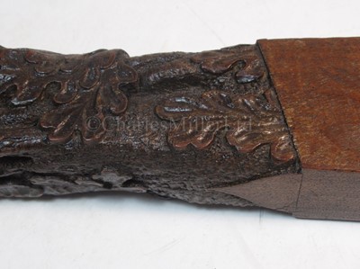 Lot 90 - A FINELY CARVED PRESENTATION TILLER FOR HMS RATTLESNAKE, CIRCA 1870