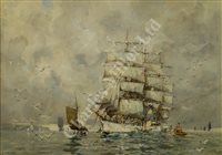 Lot 14 - FRANK KELSEY (BRITISH, Fl. 1887–1923) - A clipper lying in the Falmouth Roads with an oyster boat