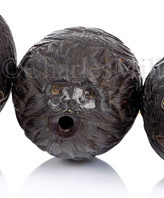 Lot 33 - A 19TH CENTURY CARVED COCONUT BUGBEAR