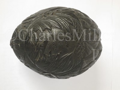 Lot 123 - A 19TH CENTURY CARVED COCONUT BUGBEAR