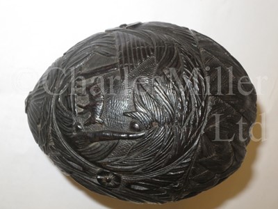 Lot 123 - A 19TH CENTURY CARVED COCONUT BUGBEAR