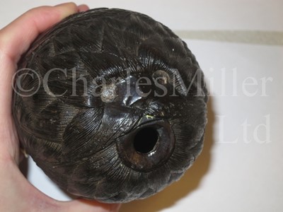 Lot 123 - A 19TH CENTURY CARVED COCONUT BUGBEAR
