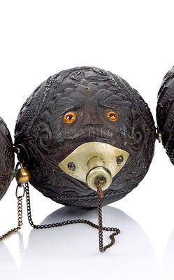 Lot 30 - A 19TH CENTURY CARVED COCONUT BUGBEAR