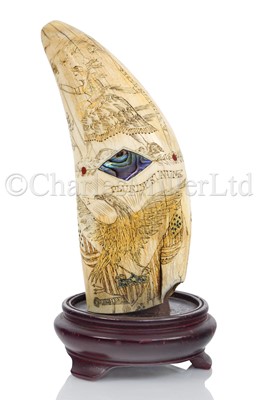Lot 45 - Ø AN UNUSUAL SCRIMSHAW DECORATED WHALE'S TOOTH