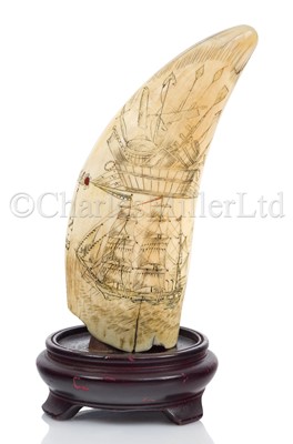 Lot 121 - Ø AN UNUSUAL SCRIMSHAW DECORATED WHALE'S TOOTH