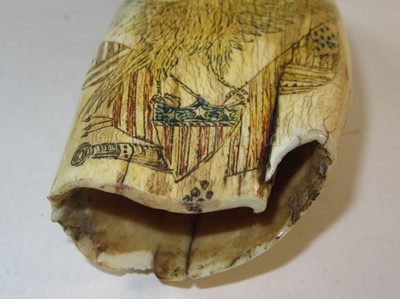 Lot 121 - Ø AN UNUSUAL SCRIMSHAW DECORATED WHALE'S TOOTH