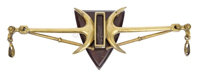 Lot 59 - A 19TH CENTURY BRASS TILLER YOKE