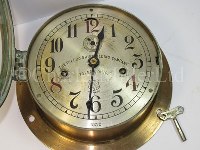 Lot 165 - AN AMERICAN BULKHEAD SHIP’S CLOCK FOR THE TOLEDO SHIPBUILDING COMPANY CIRCA 1900