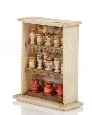Lot 174 - AN EARLY 19TH CENTURY NAPOLEONIC FRENCH PRISONER OF WAR BONE MODEL OF A CUPBOARD
