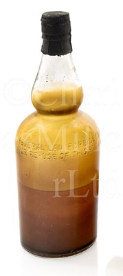 Lot 224 - A BOTTLE OF EXPORT WHISKY RECOVERED FROM THE S.S. POLITICIAN, WRECKED ISLE OF BARRA 1940, RECOVERED 1966