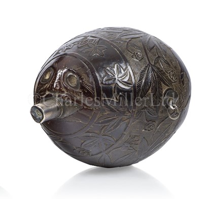 Lot 41 - A CARVED COCONUT BUGBEAR FLASK, CIRCA 1830