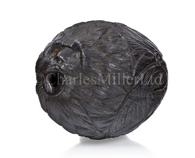 Lot 39 - A CARVED COCONUT BUGBEAR, CIRCA 1800
