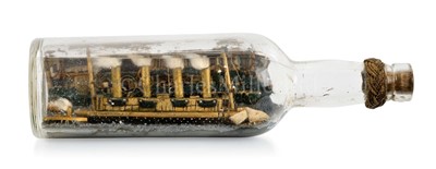Lot 79 - A COMMEMORATIVE SHIP IN BOTTLE MODEL OF R.M.S. LUSITANIA MADE BY A SURVIVOR, 1915