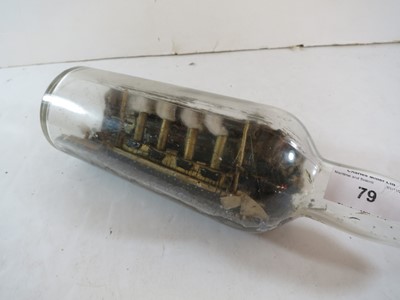 Lot 79 - A COMMEMORATIVE SHIP IN BOTTLE MODEL OF R.M.S. LUSITANIA MADE BY A SURVIVOR, 1915
