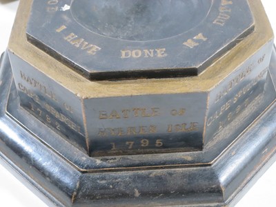 Lot 144 - A 1905 TRAFALGAR CENTENARY CANNON BALL AND STAND COMMEMORATING H.M.S. VICTORY'S BATTLES