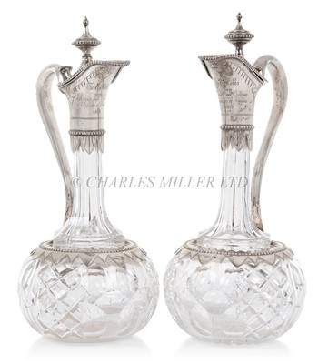 Lot 14 - A PAIR OF GERMAN SILVER-MOUNTED ROYAL PRESENTATION CUT GLASS CLARET JUGS, CIRCA 1869