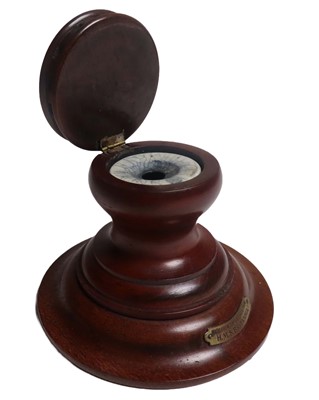 Lot 88 - AN INKWELL MADE FROM H.M.S. 'BRITANNIA' TREEN