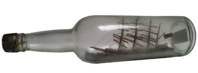 Lot 37 - A 19TH CENTURY SHIP IN A BOTTLE