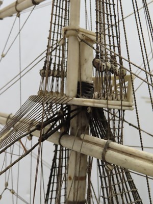 Lot 175 - A LARGE FULLY RESTORED NAPOLEONIC PRISONER-OF-WAR BONE SHIP MODEL FOR H.M.S. 'UNICORN'