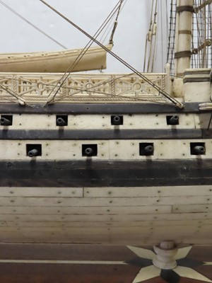 Lot 175 - A LARGE FULLY RESTORED NAPOLEONIC PRISONER-OF-WAR BONE SHIP MODEL FOR H.M.S. 'UNICORN'