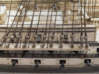 Lot 175 - A LARGE FULLY RESTORED NAPOLEONIC PRISONER-OF-WAR BONE SHIP MODEL FOR H.M.S. 'UNICORN'