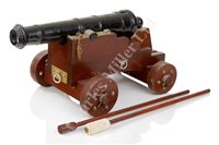 Lot 190 - A DECORATIVE IRON CANNON<br/>painted black, the...