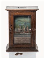 Lot 132 - A RARE ROCKING AUTOMATON COLLECTION BOX FOR...