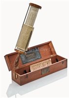 Lot 209 - A FULLER-TYPE CALCULATING SLIDE RULE BY...