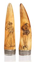 Lot 103 - Ø A PAIR OF SILVER-MOUNTED SCRIMSHAW DECORATED...