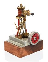 Lot 122 - A SINGLE CYLINDER MODEL MARINE ENGINE<br/>cast in...