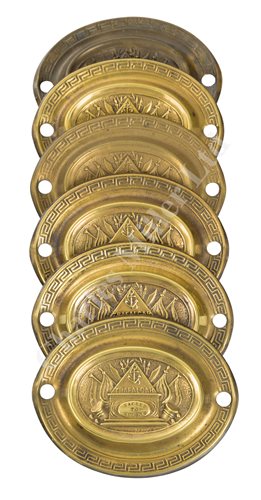 Lot 72 - A SET OF SIX PRESSED BRASS COMMEMORATIVE DRAWER ESCUTCHEONS FOR TRAFALGAR, CIRCA 1806
