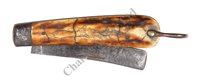 Lot 140 - A WHALER'S SCRIMSHAW DECORATED FOLDING POCKET...